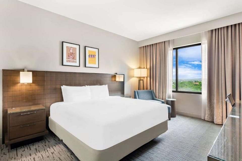 Stretch out and enjoy peaceful views from your cozy bed.