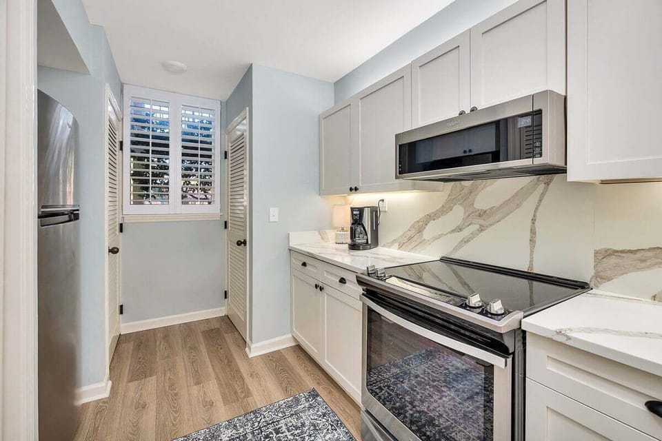 King & Prince 176 Renovated Kitchen with stainless steel appliances