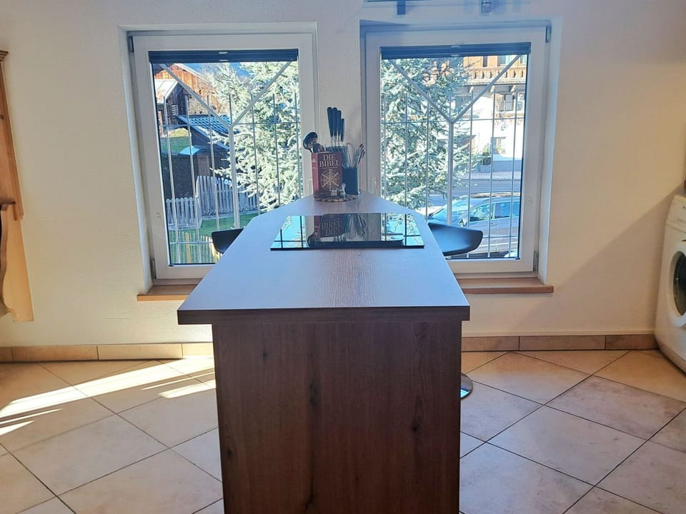 Cabinetry, Countertop, Wood, Window, Interior Design, Floor, Flooring, Building, Hardwood, Kitchen