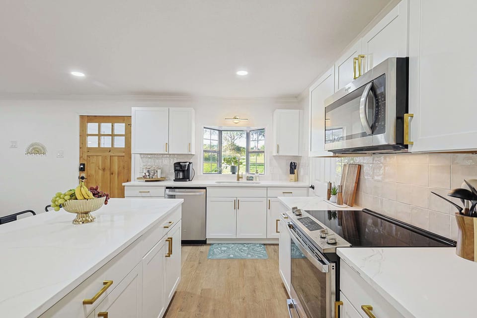 Perfect kitchen with stove, oven, and microwave for every meal