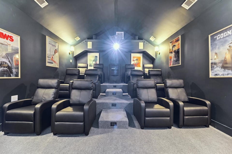 Grab some homemade popcorn form the popcorn machine and pack out the theater room to watch your favorite classics on the projector screen. 