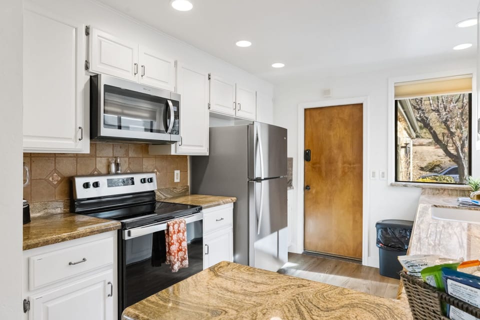 A fully equipped kitchen with modern appliances, ample counter space, and all the essentials, making it easy and enjoyable to prepare delicious meals.