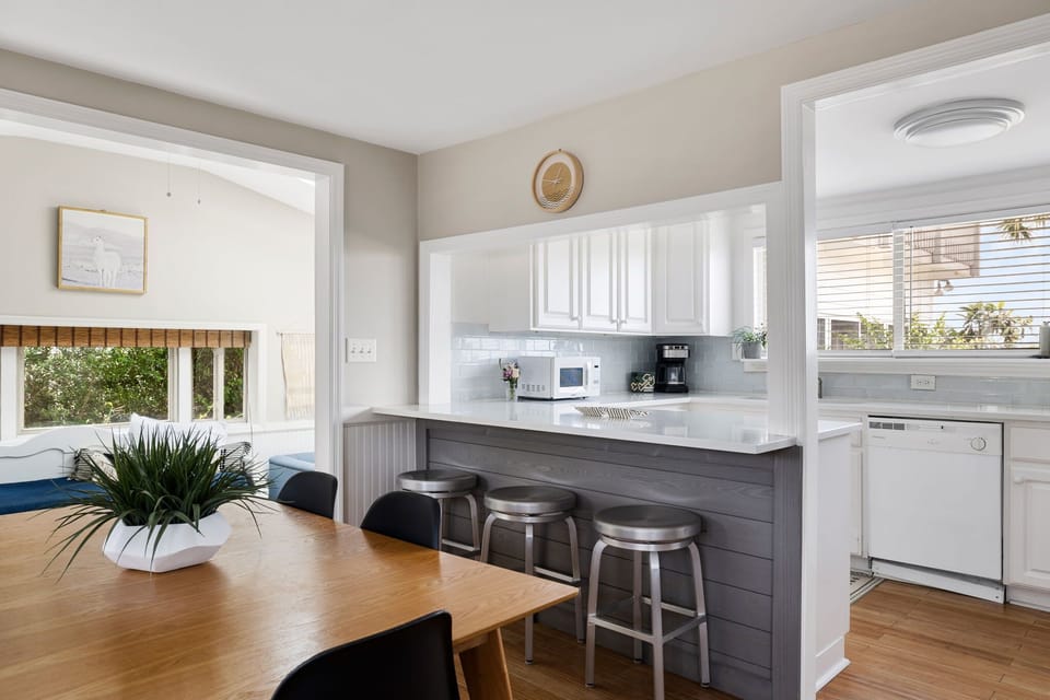 Fully equipped kitchen with everything you need to cook a meal & barstool seating for your group. 