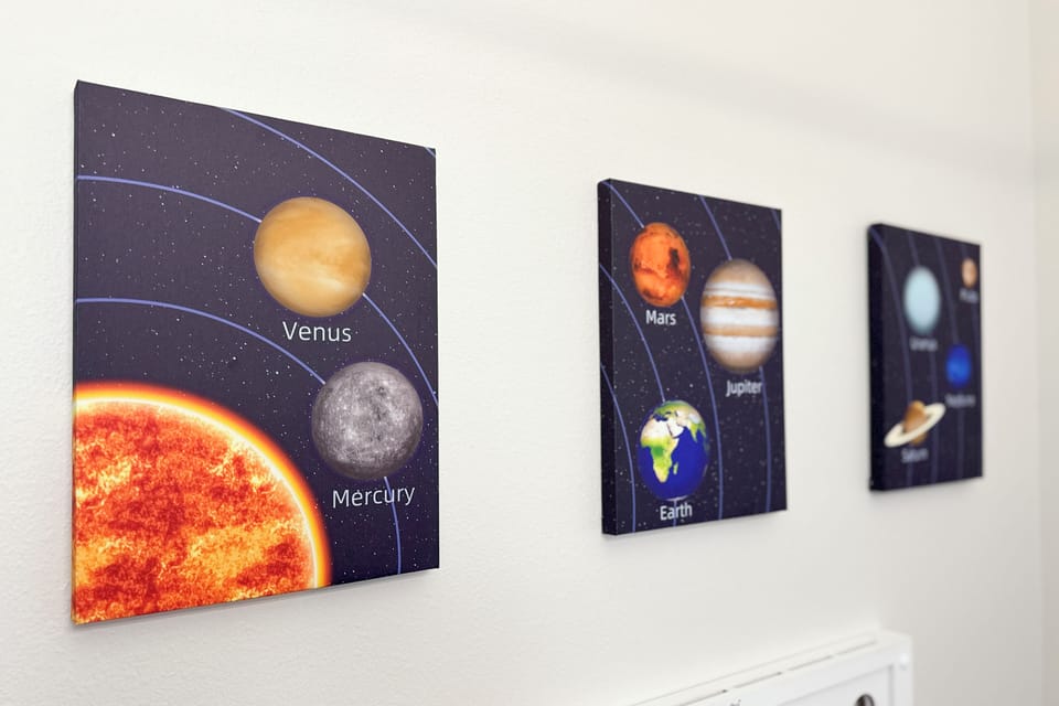 Space Room - Space-themed bedroom with two twin beds, thoughtfully decorated with elements that capture the wonder of space exploration. The room evokes the thrill of discovery, creating an immersive and imaginative space for stargazers and dreamers of all ages.