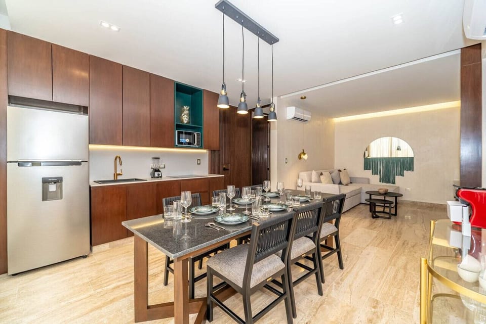 Cook, dine, and relax in this bright and inviting kitchen and dining space