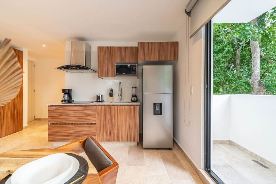 Savor your meals with a view of the fully equipped kitchen, perfect for dining and entertaining