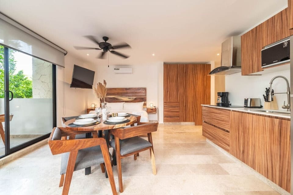 A spacious dining table right across from the kitchen, making meal times easy and enjoyable