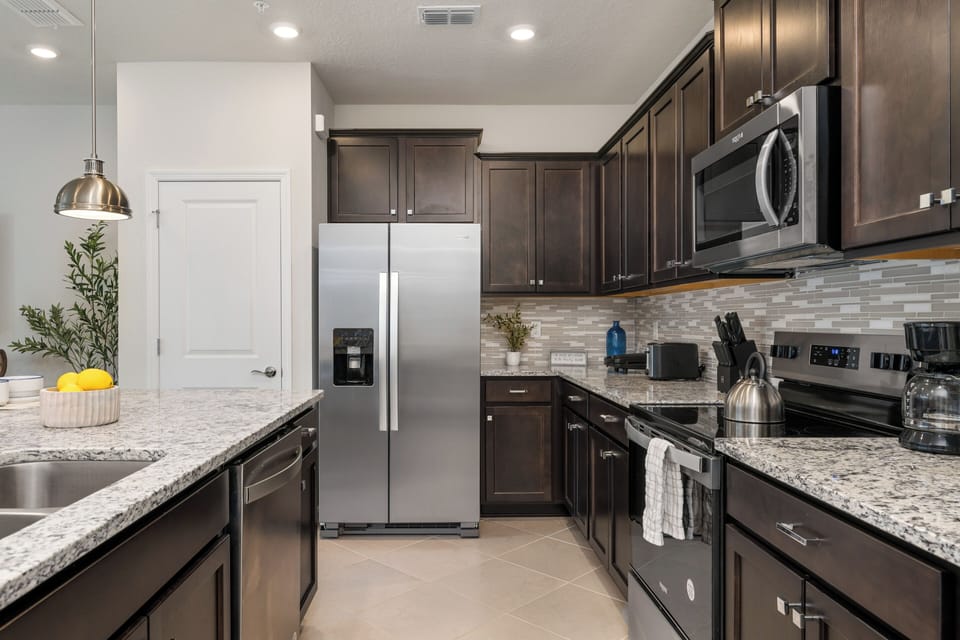 Get ready for the day and prepare your meals with modern stainless steel appliances.