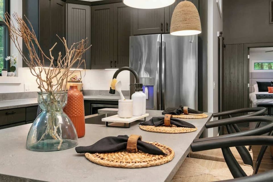 The spacious island is perfect for dining, meal prep, or gathering with loved ones, creating a welcoming space to cook and connect.