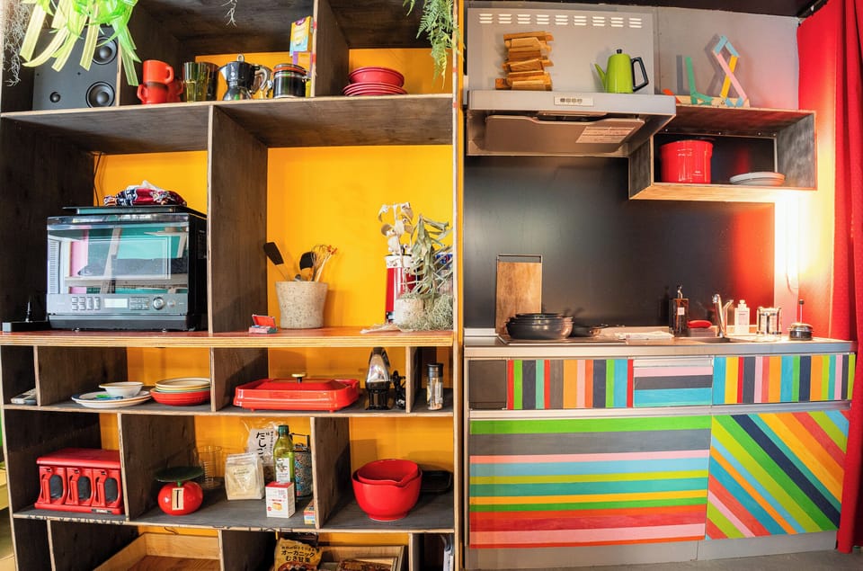 Fully equipped with an oven, microwave, and vintage dishware