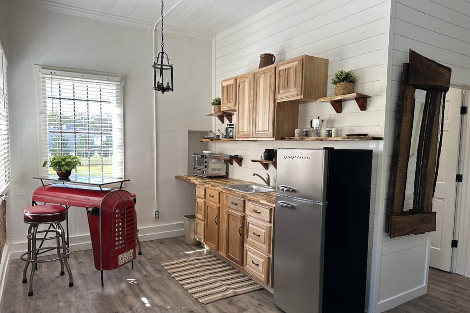 Mini-kitchen stocked with all the basics you need for a quick meal or food delivery