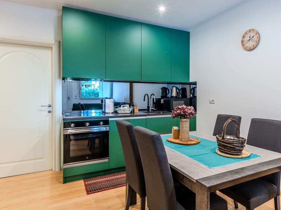 Interior Design, Furniture, Kitchen, Kitchen Appliance, Flooring, Countertop, Wood, Major Appliance, Cabinetry, Ceiling