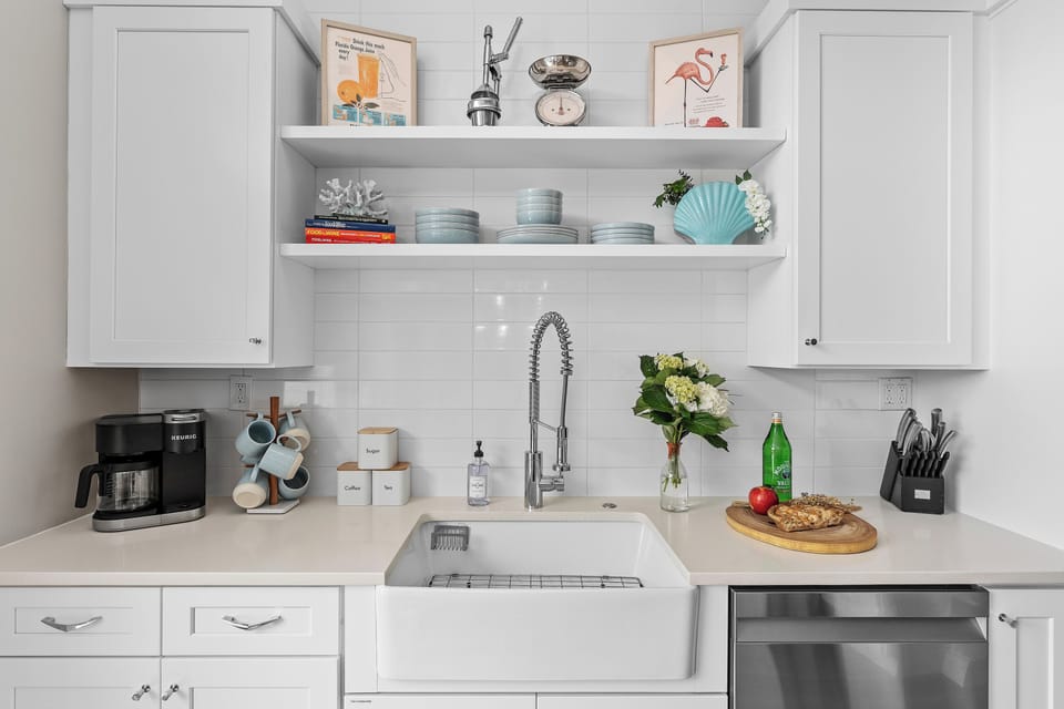 Coffee station and farmhouse sink.