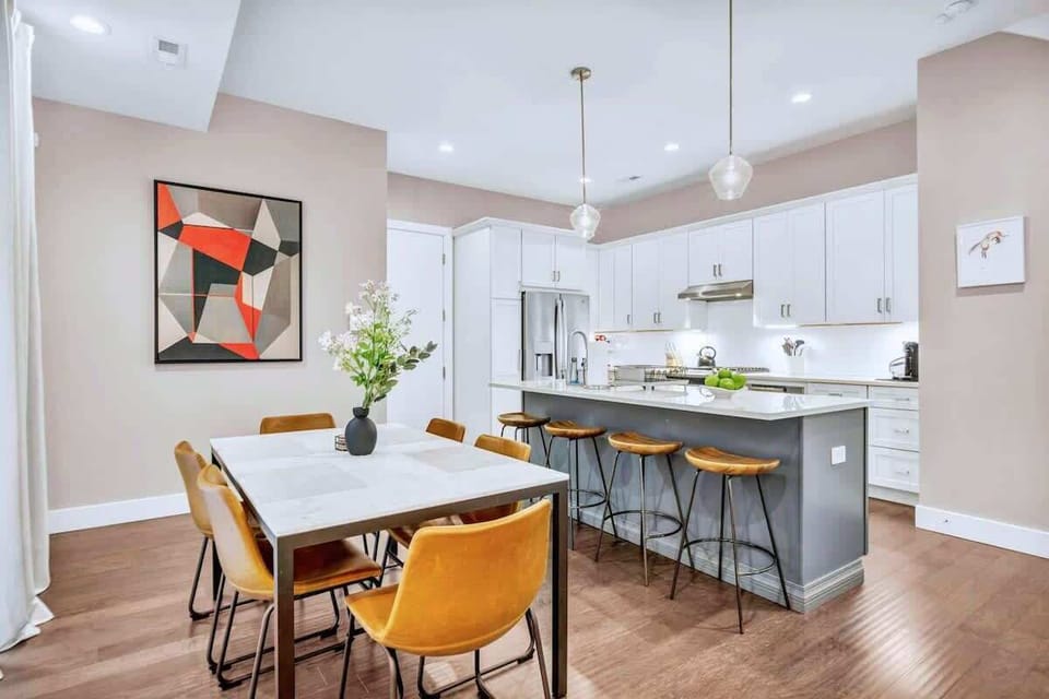 Whip up meals in a fully stocked kitchen, then gather at the stylish dining set or sip cocktails at the sleek island—this inviting space is perfect for connection, laughter, and unforgettable moments.