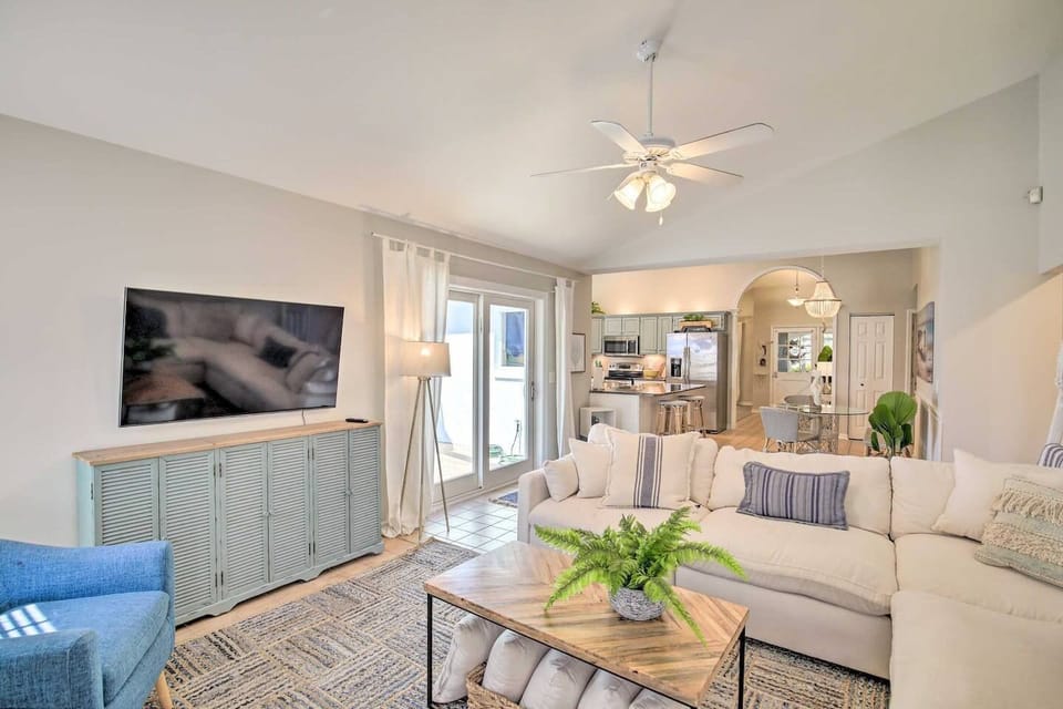 The light switch that turns on the pool light is to the right of this sliding glass door.  