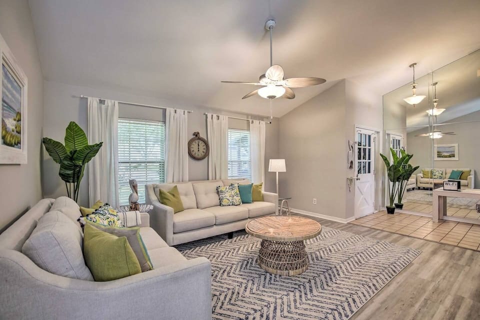 This living room is a perfect place to sit, plays games (located in the cabinets), and spend quality time.