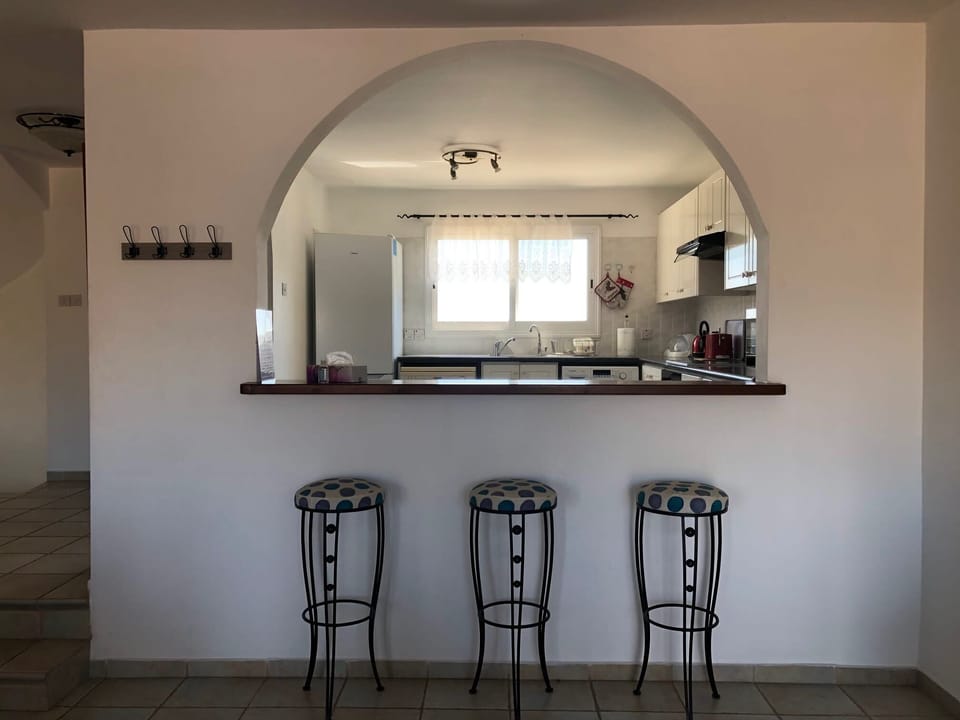 Huge kitchen hatch overlooking dining and living area