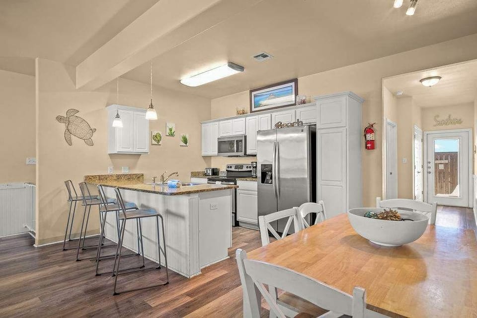 Enjoy seamless flow in our open-concept dining and kitchen area, perfect for cooking and gathering.