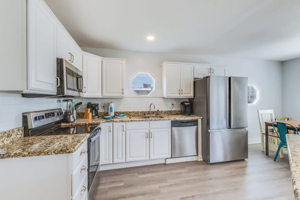 There is a Keurig and a regular drip coffee maker. Upper Level
