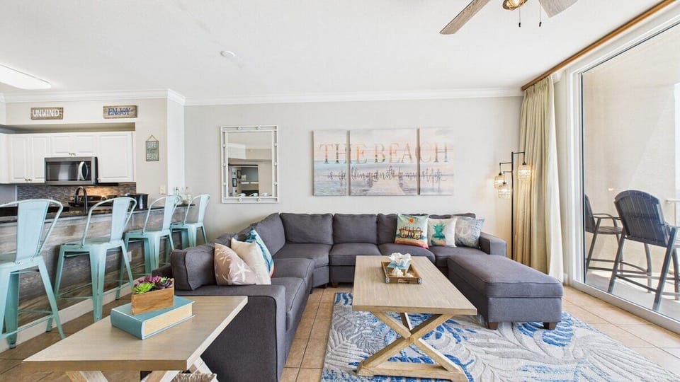 Open concept living area with comfortable furnishings TV