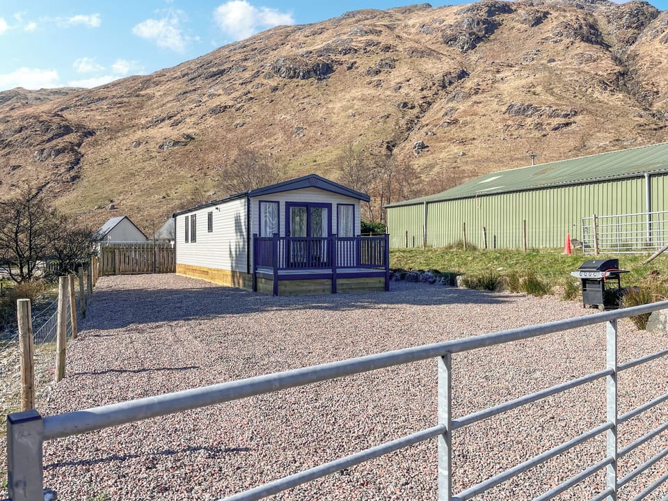 exteriand enclosed garden area | Katie&rsquo;s Cosy Caravan - Shepherds Holidays, Kilmallieu