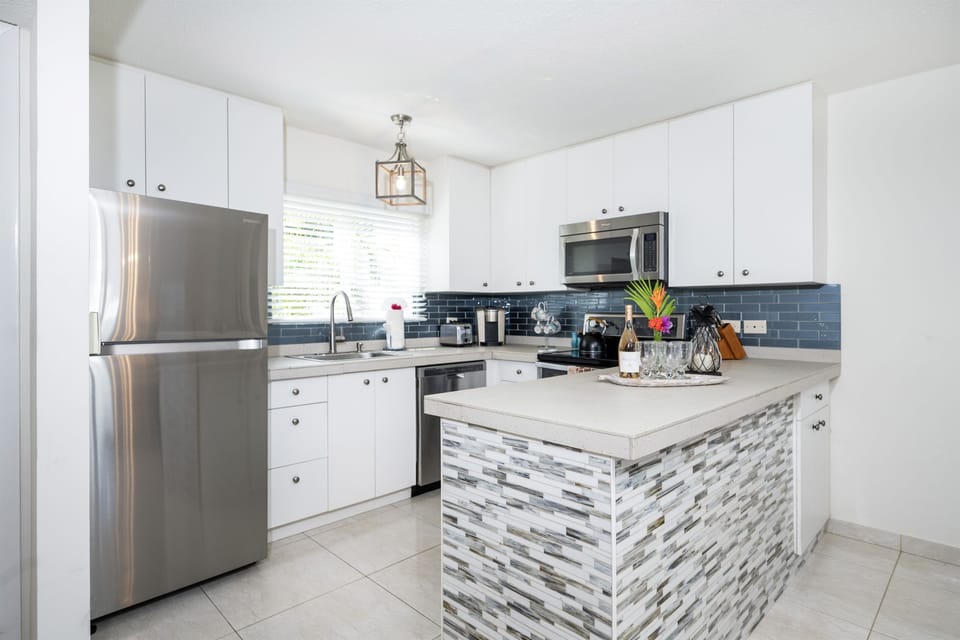 This well stocked kitchen has everything you need to prepare meals at home.