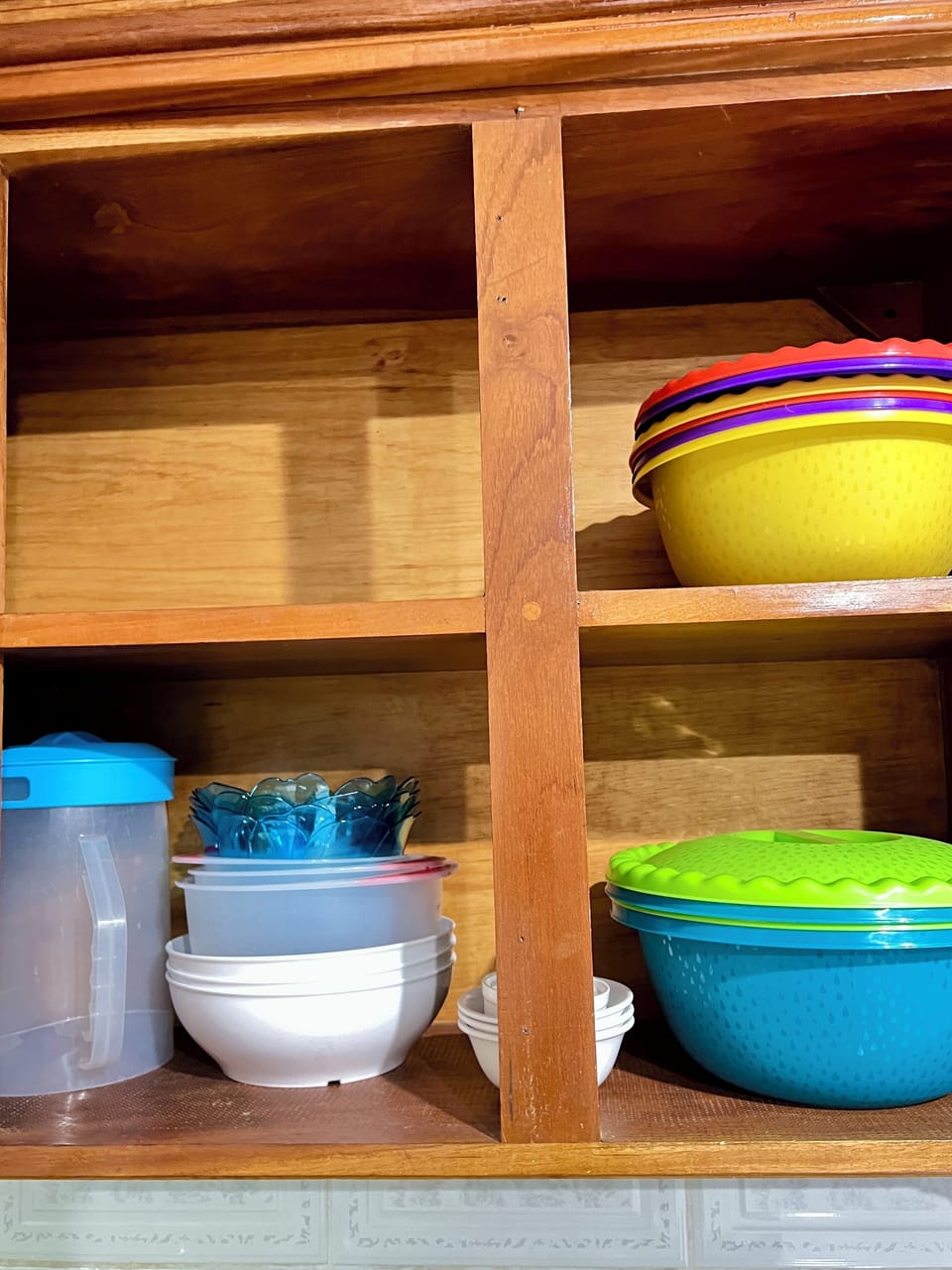 Plenty of large bowls with lids, pitcher, and smaller bowls for your use.