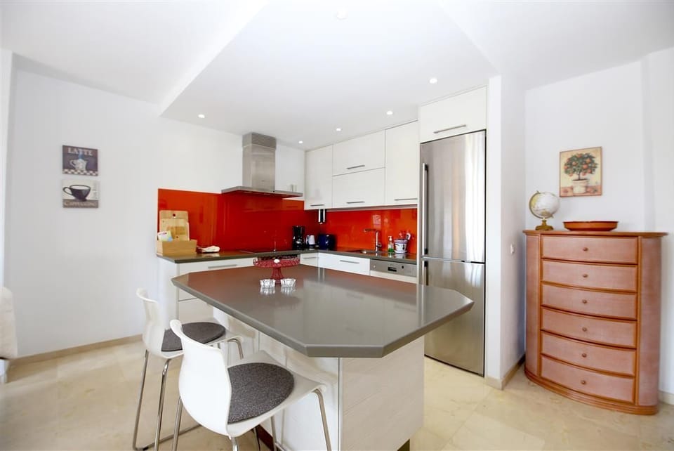 Another view of the lovely modern kitchen in this property