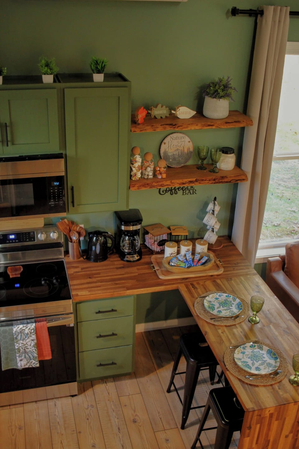 Fully Stocked Kitchen with Full Coffee/Tea Bar with Snacks and Bar Eating Area