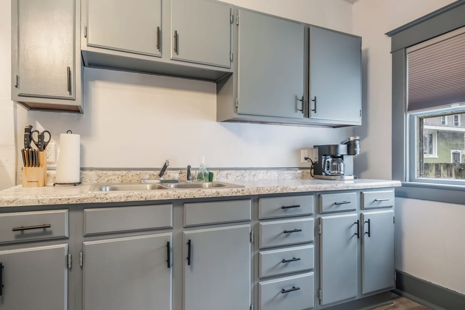 - Fully equipped kitchen featuring sleek cabinets, modern hardware, and essentials   - Bright countertop space perfect for meal prep or morning coffee setup   - Designed for convenience with updated appliances and natural light