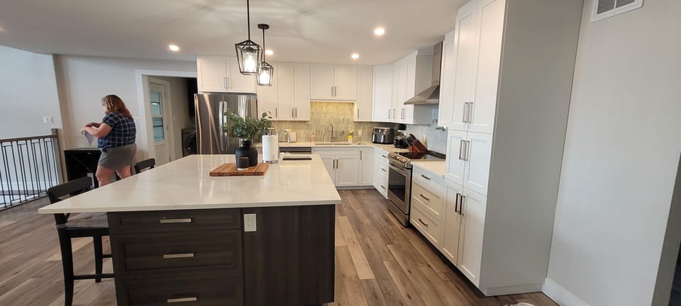 kitchen - looks over living room and view to lake