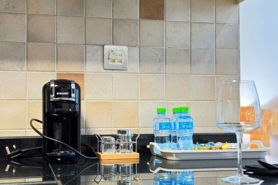 A modern kitchenette with all the essentials for your stay.