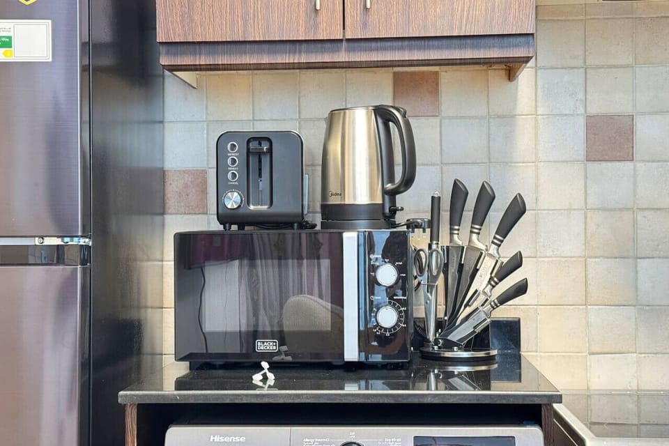 Sleek and efficient, making cooking a breeze in your studio.