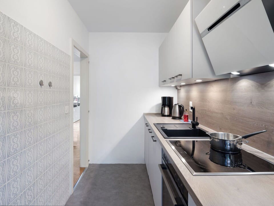 Kitchen, Countertop, Major Appliance, Kitchen Appliance, Flooring, Kitchen Sink, Interior Design, Kitchen Stove, Cabinetry, Floor