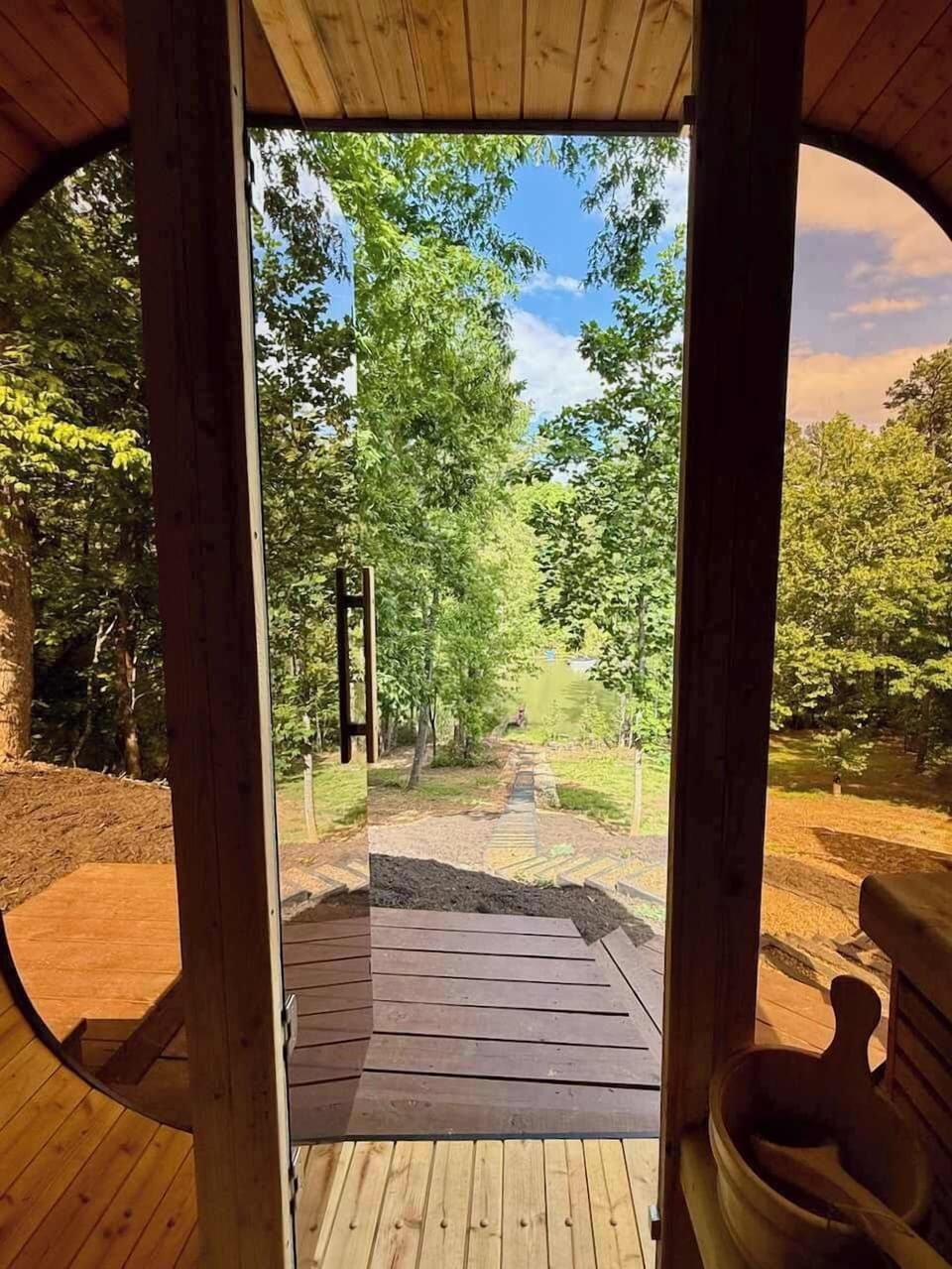Step into the sauna and unwind while taking in the peaceful views of Lake Adger, where warm cedar, fresh air, and total relaxation come together. 