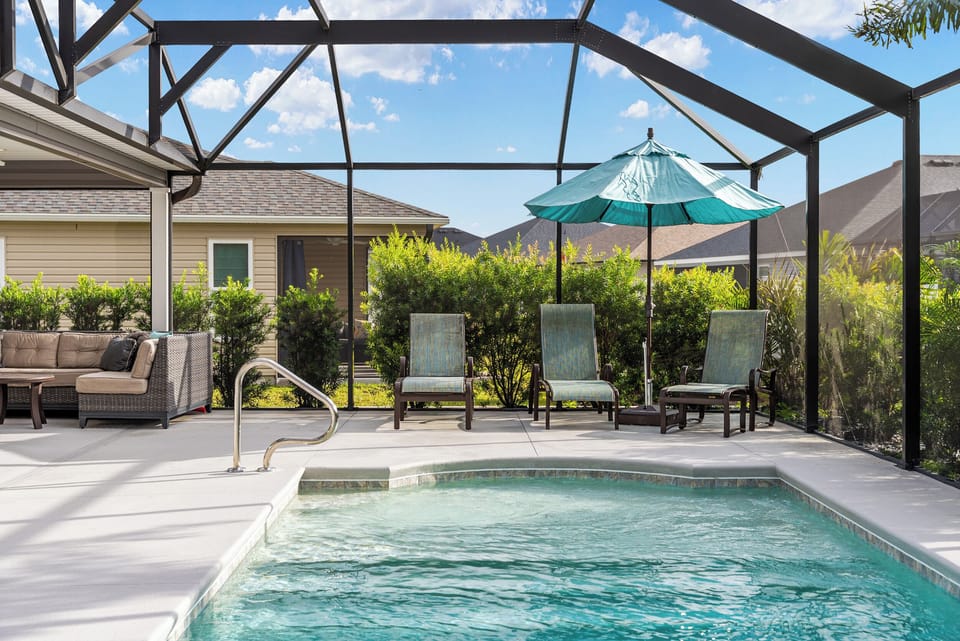 Screened-in Lounge Seating Pool-Side