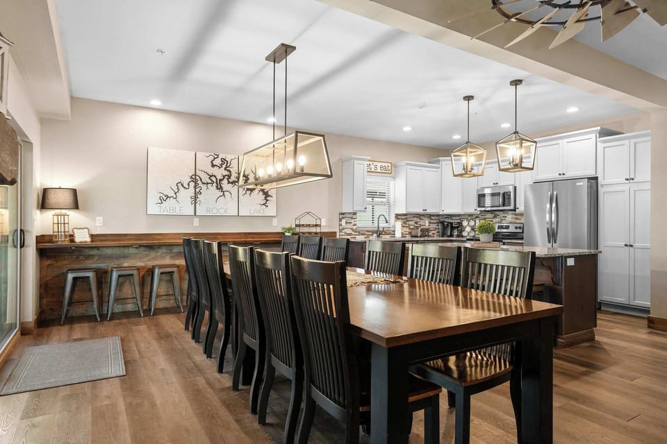 Lot of seating at the island, the bar, and the table!