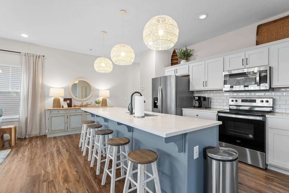 The oversized island is a great spot to cook and serve up food for your large group!