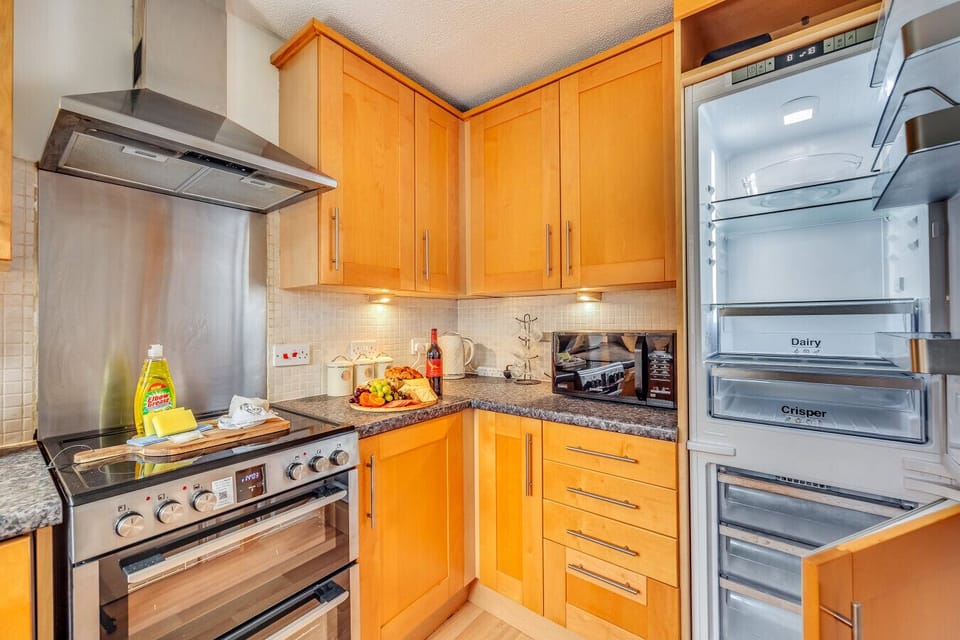 The kitchen is fully equipped with everything you need to prepare a home-cooked mea