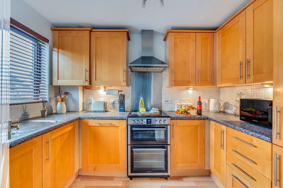 The kitchen is fully equipped with everything you need to prepare a home-cooked mea