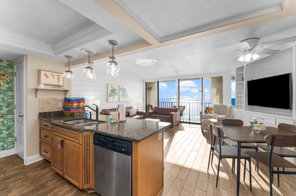 Kitchen opens up to the dining & living areas, with ocean views