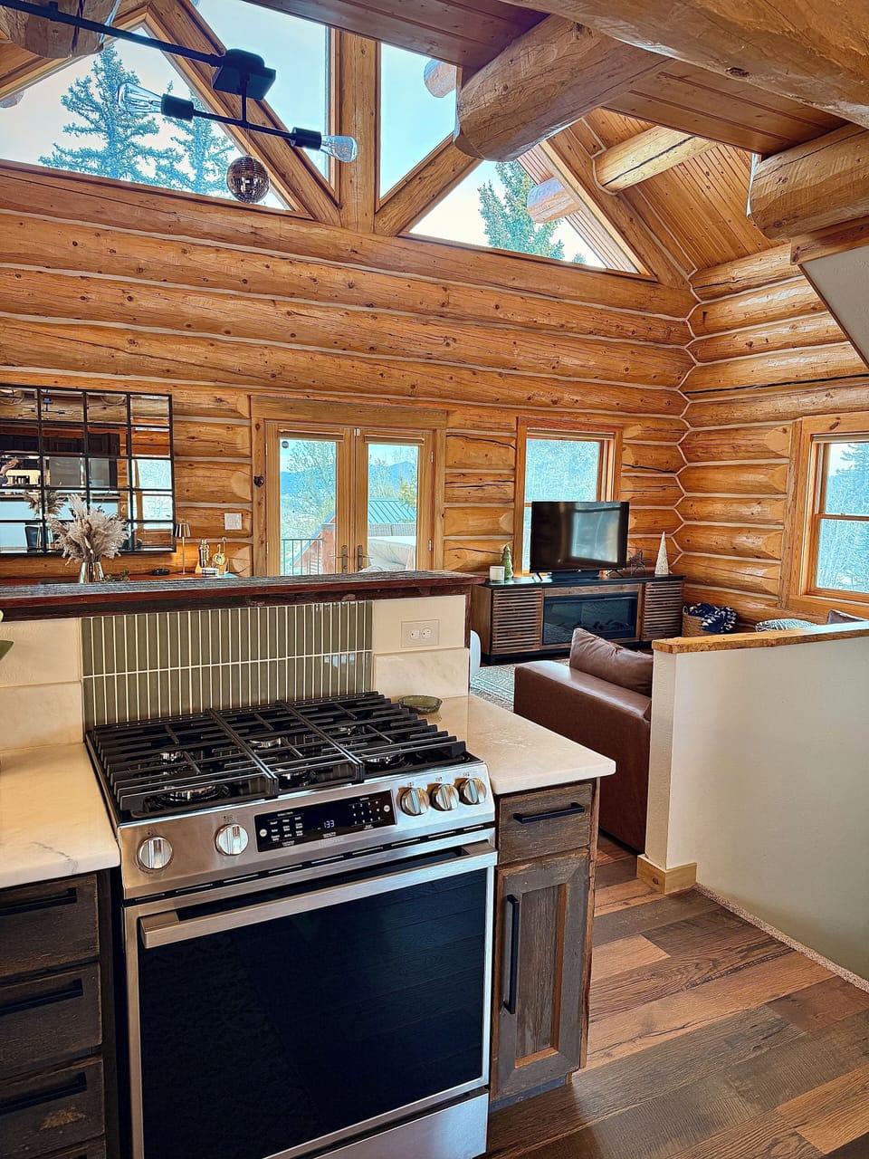 The open layout kitchen with gas range.