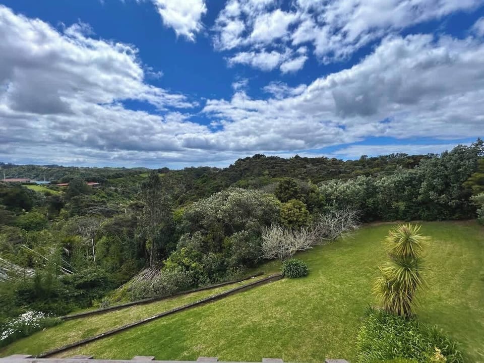 Large sloping lawn and bush - lawn not fenced