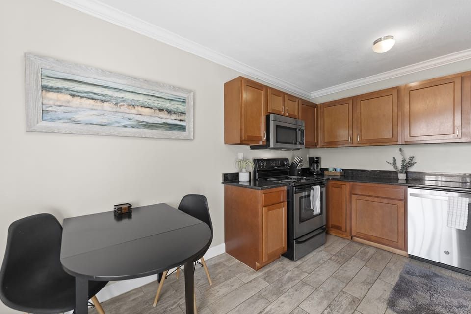 The kitchen opens directly to the dining area, making meals and entertaining simple and convenient.