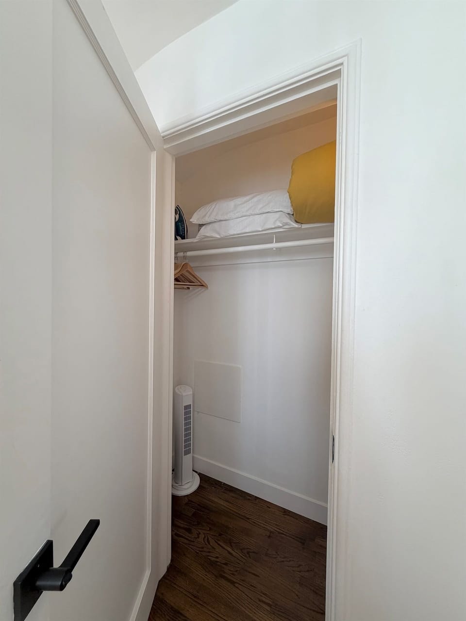 Spacious closet with iron, board, extra pillows and blanket for your comfort.