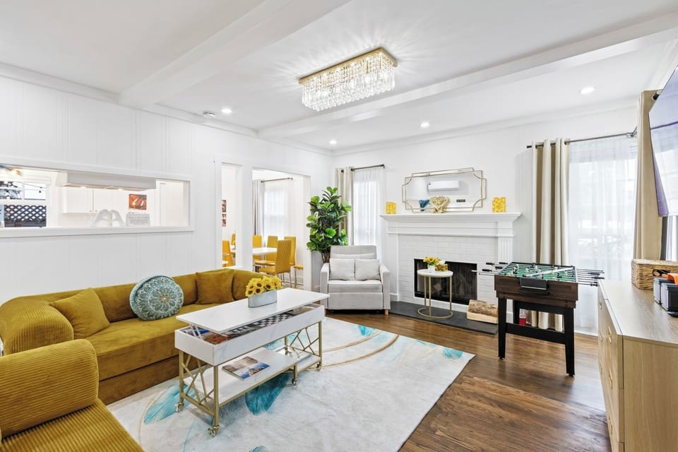 Cozy living room with Smart TV, king sofa bed, and full-size sofa bed