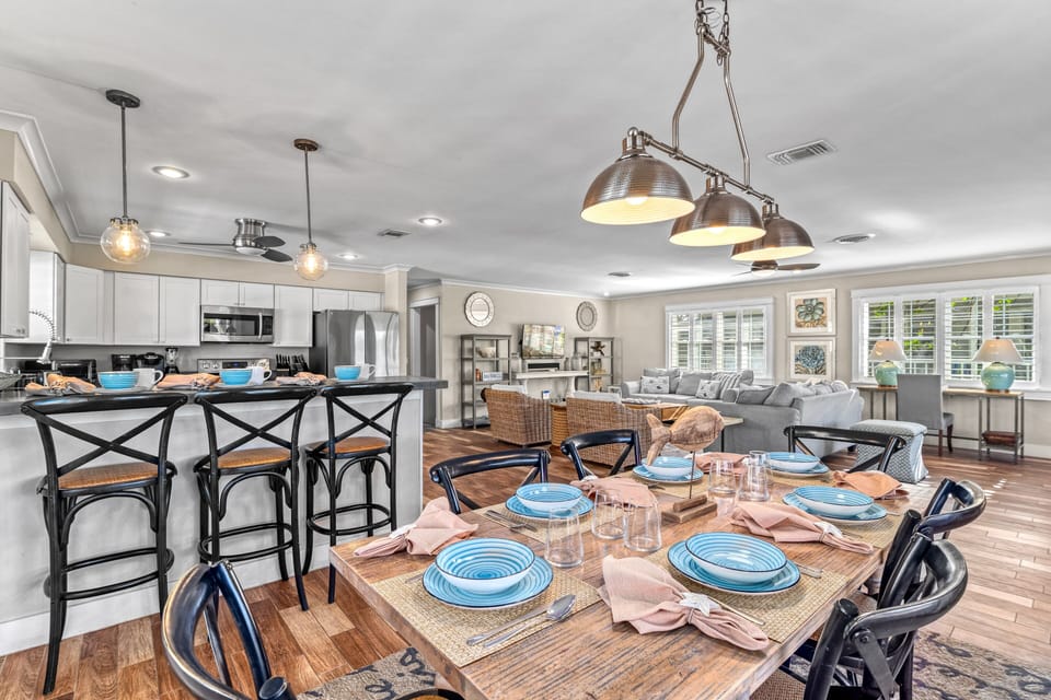 Main floor living area on the second floor with an open floor plan from the dining area.  Kitchen on the left with living room on the right.