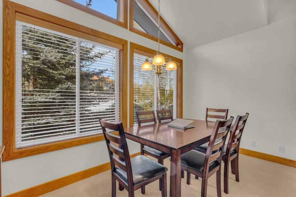 Dining Room: 6-person dining table, adjacent to living room and kitchen
