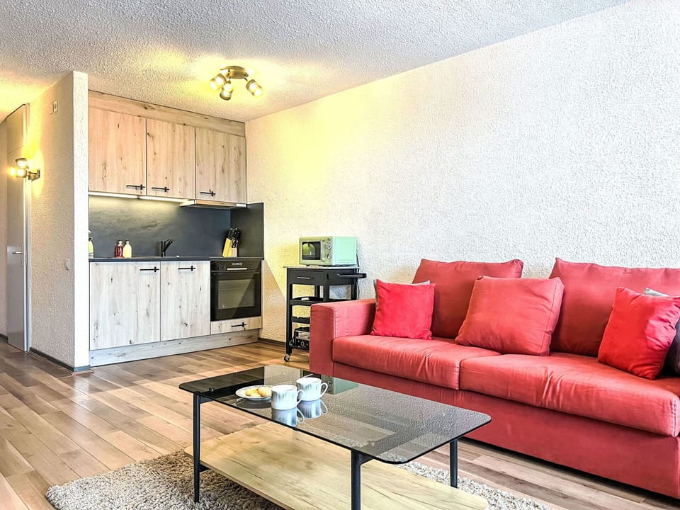 Furniture, Couch, Cabinetry, Interior Design, Lighting, Wood, Studio Couch, Floor, Living Room, Flooring