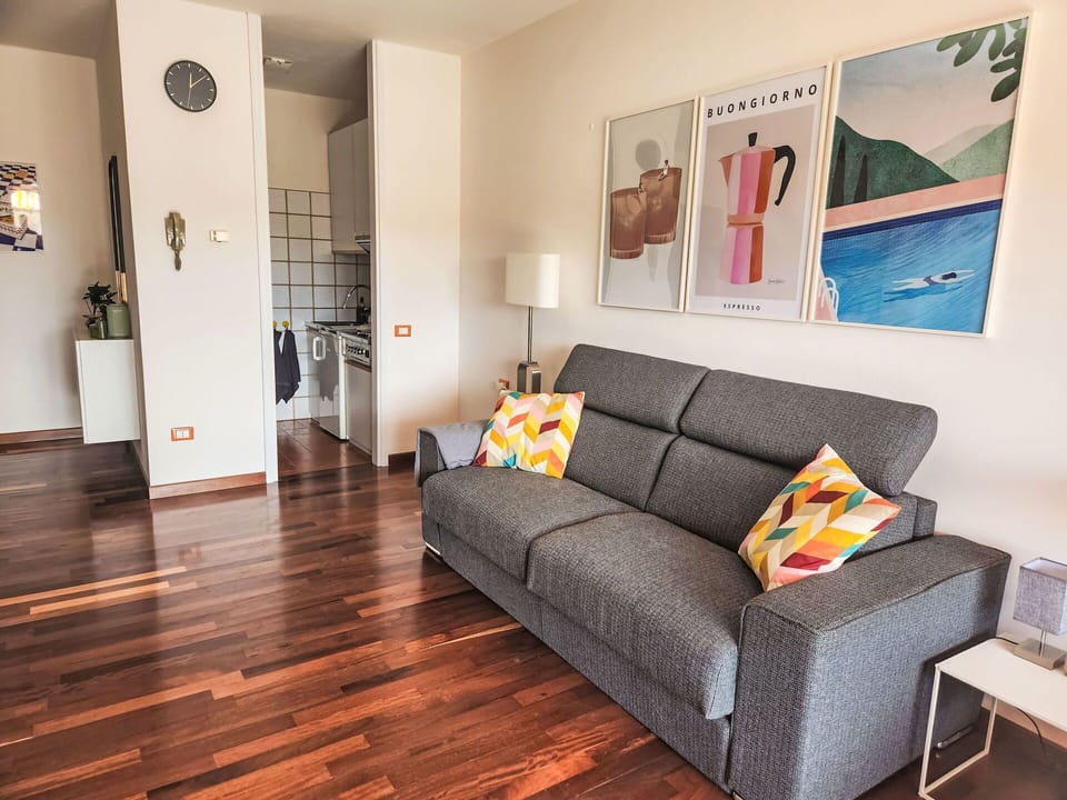 Furniture, Interior Design, Flooring, Floor, Wood, Couch, Living Room, Room, Apartment, Wood Flooring